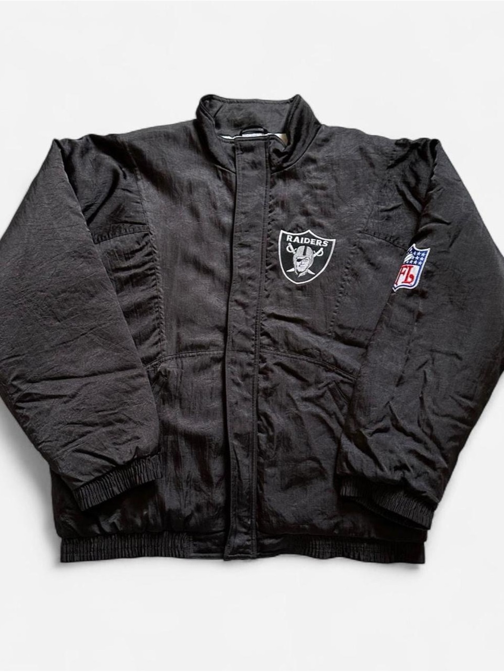 Vintage 1990s Black Oakland Raiders Men's puffer Team Jacket XL